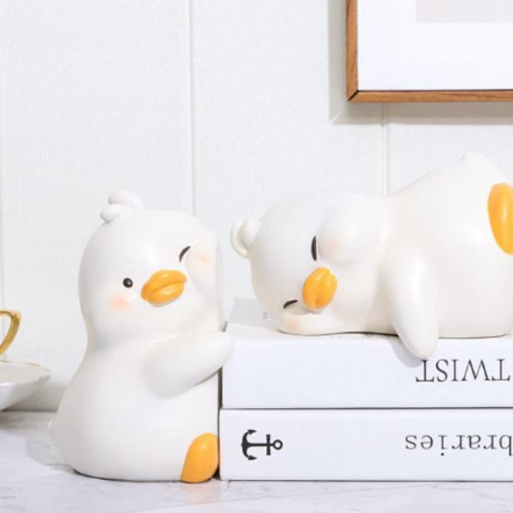 Boekensteun 'Knuffelende Eenden'
